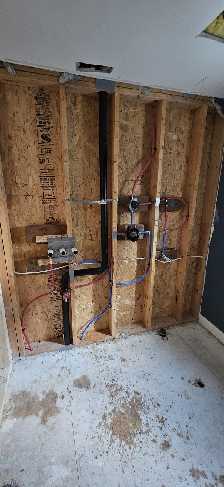 Repipe and rough-in during a bathroom remodel