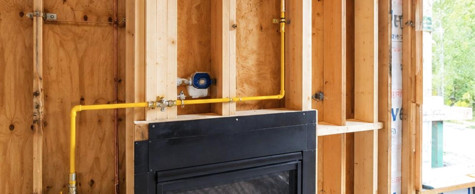 Gas line roughed in to a fireplace in a framed wall
