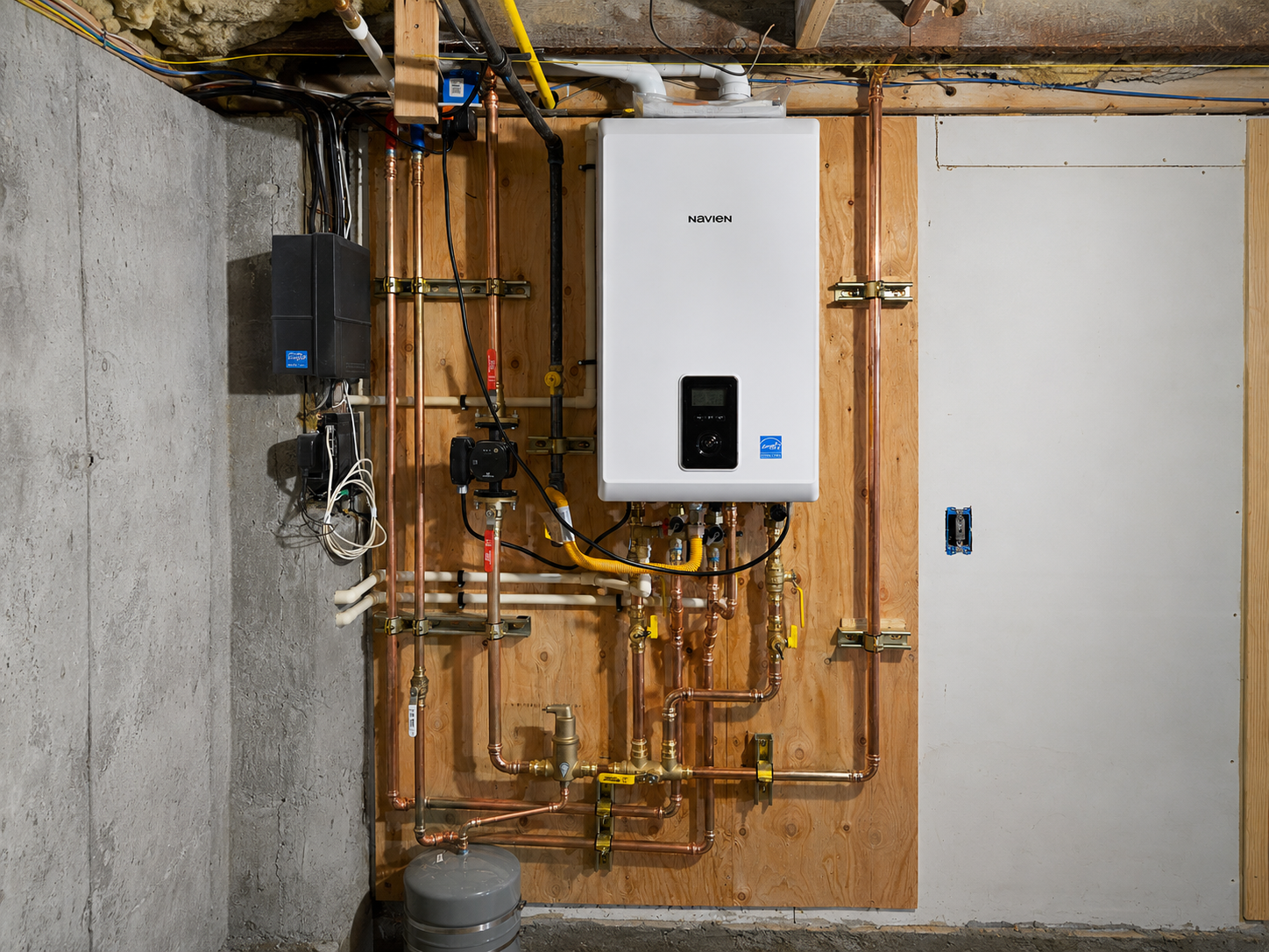 Tankless water heater with gas and water piping